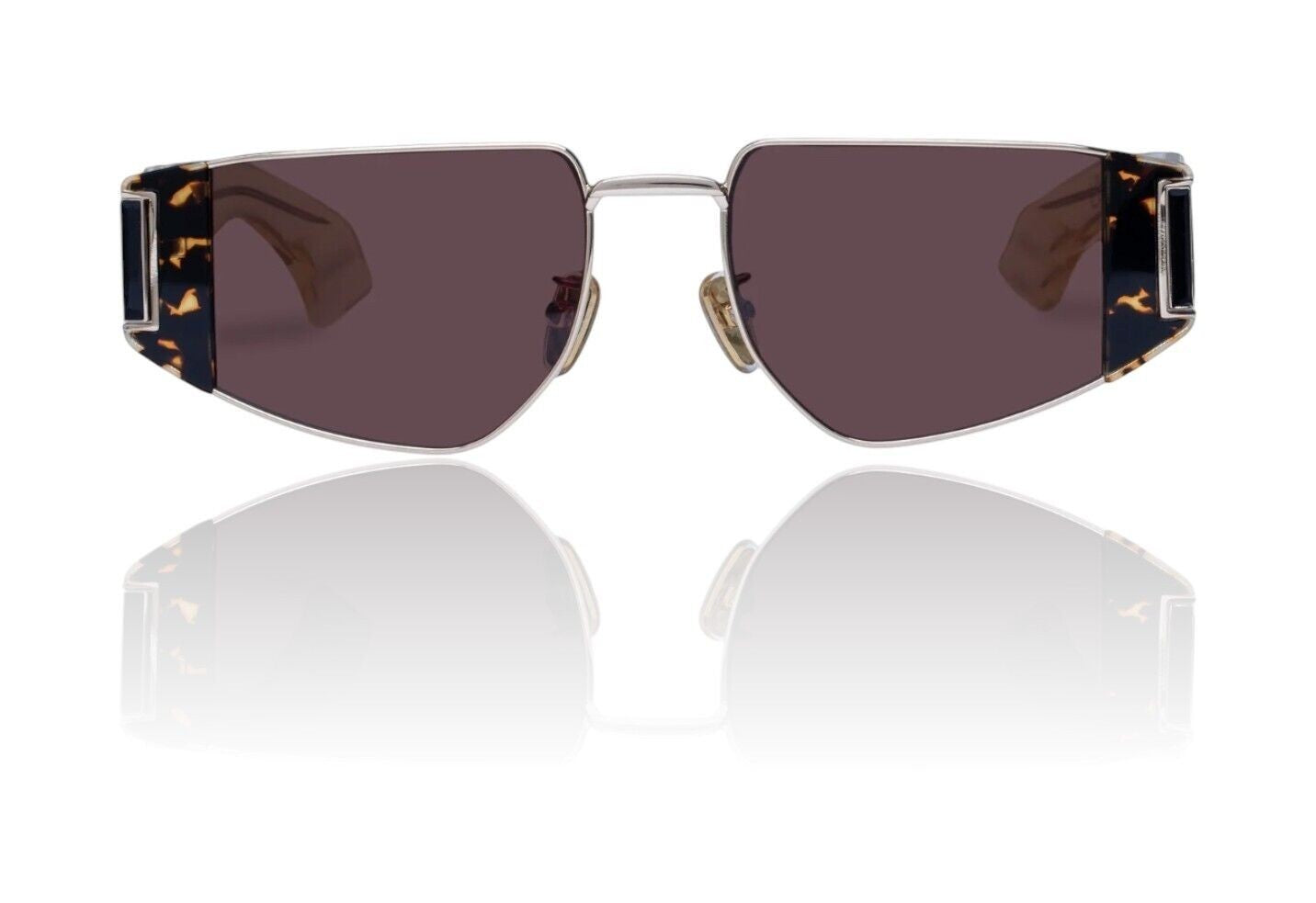 Naked Pear Karen Walker Nix sunglasses featuring a silver metal frame, brown mono lenses, and tortoiseshell acetate temples.