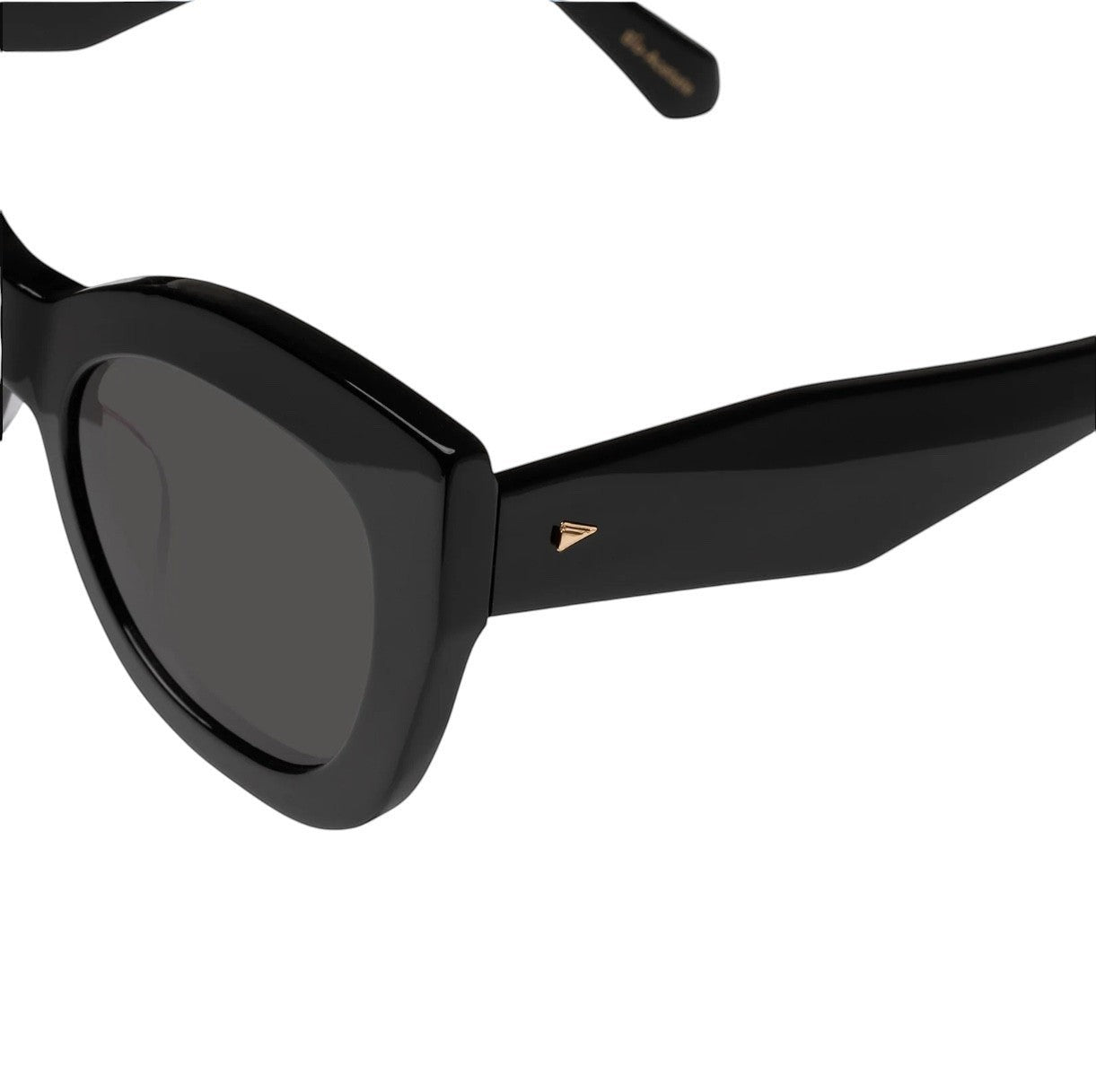Naked Pear Karen Walker Northern Lights cat eye sunglasses in black acetate with grey lenses and gold arrow hardware.