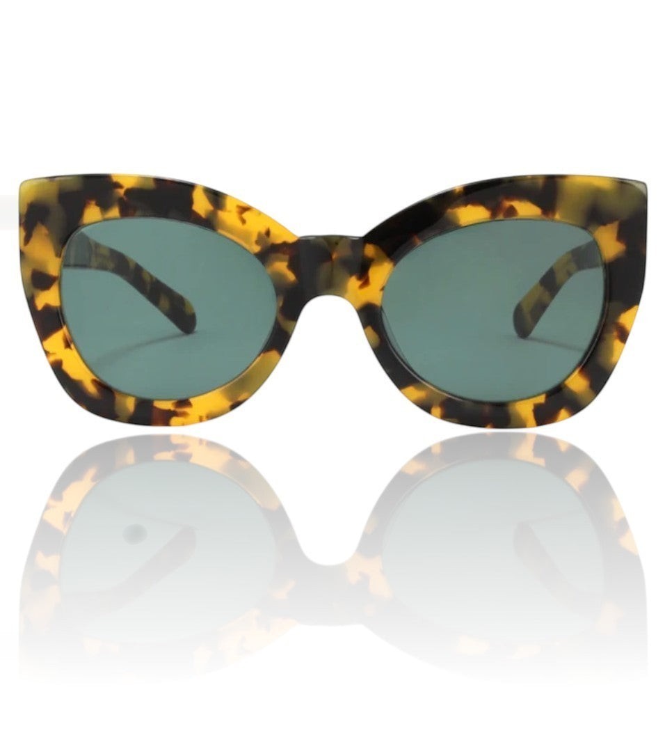 Naked Pear Karen Walker Northern Lights cat eye sunglasses in tortoise shell acetate with green lenses.