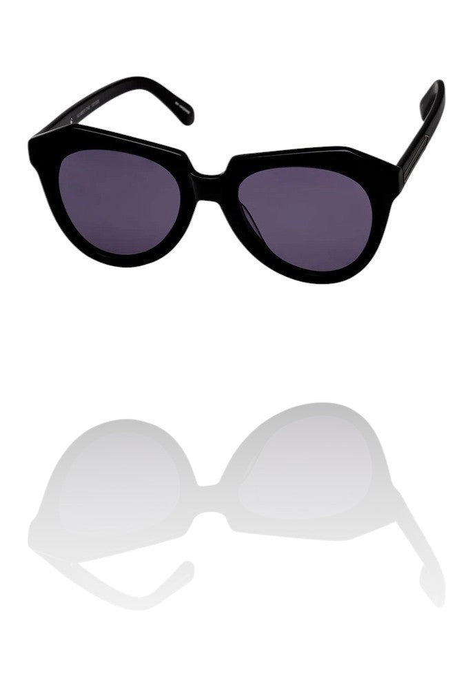 Naked Pear Karen Walker Number One black bio-acetate cat eye sunglasses with grey smoke mono lenses.
