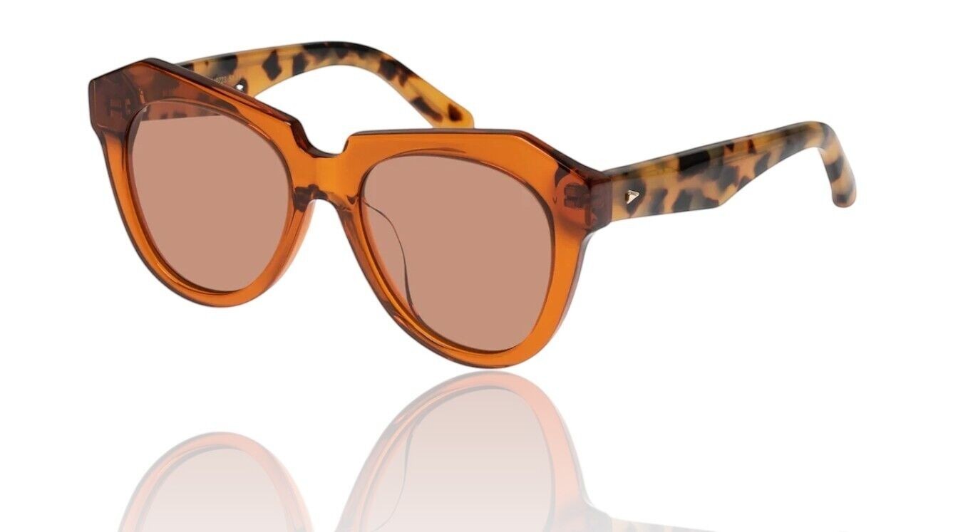 Naked Pear Karen Walker Number One oversized cat-eye sunglasses with persimmon acetate frames and tortoise shell arms.