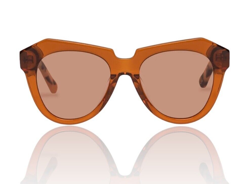 Naked Pear Karen Walker Number One oversized cat-eye sunglasses in persimmon acetate with tonal lenses.