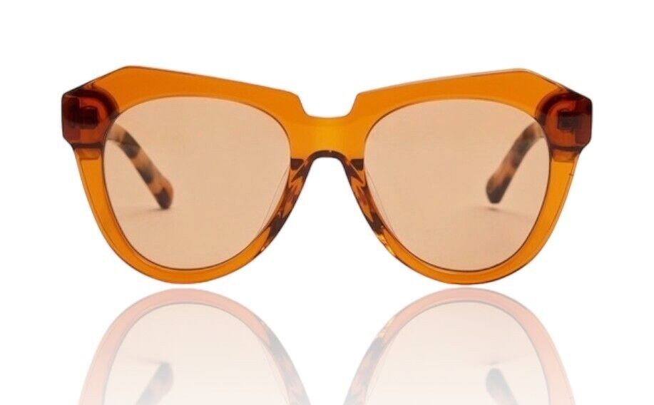 Naked Pear Karen Walker Number One sunglasses in persimmon acetate with a cat-eye shape and tortoise shell arms.