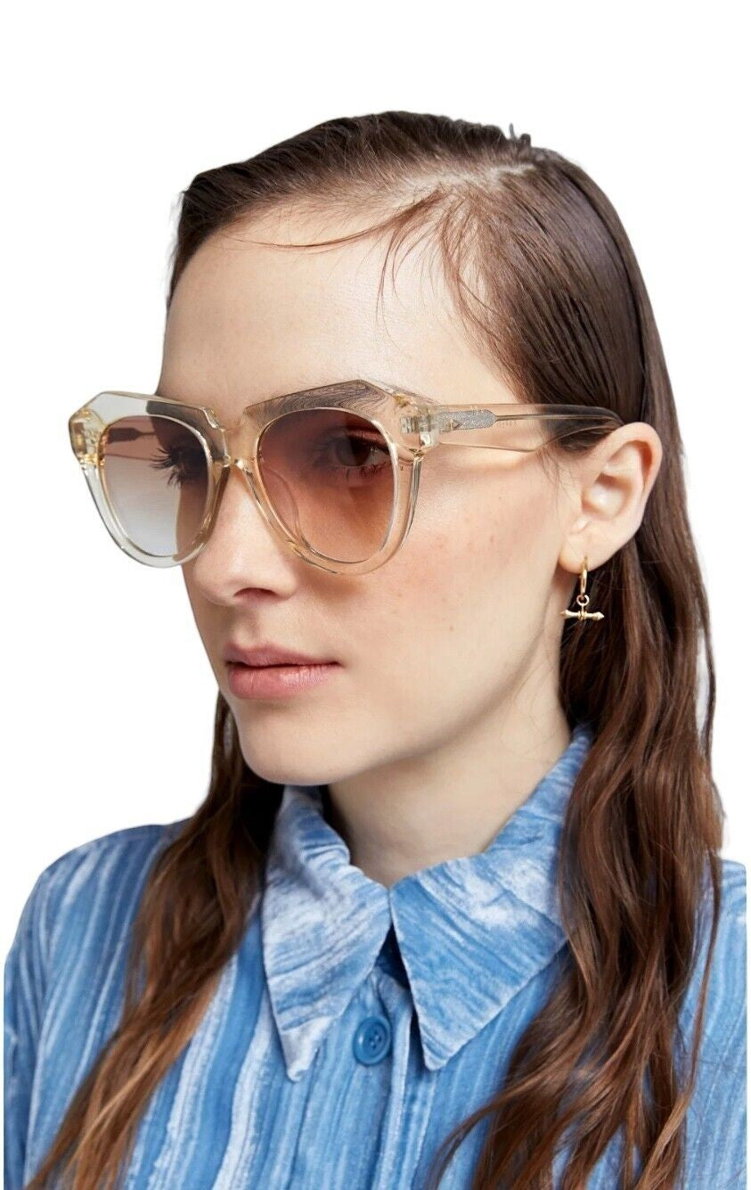 Naked Pear Karen Walker Number One cat-eye sunglasses in vintage clear bio-acetate with soft brown gradient lenses.