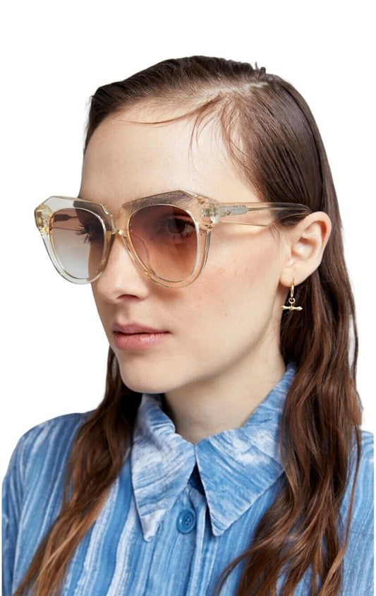 Naked Pear Karen Walker Number One cat-eye sunglasses in vintage clear bio-acetate with soft brown gradient lenses.