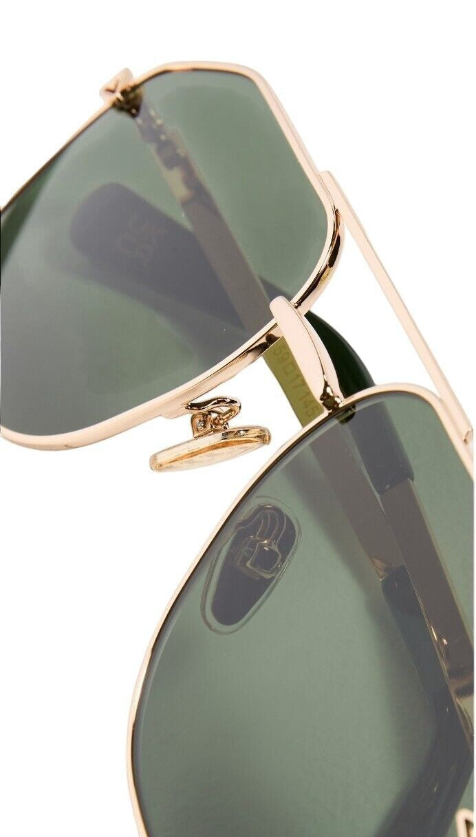 Naked Pear Karen Walker Pampel aviator sunglasses featuring polished gold frames and vibrant grass-green lenses.