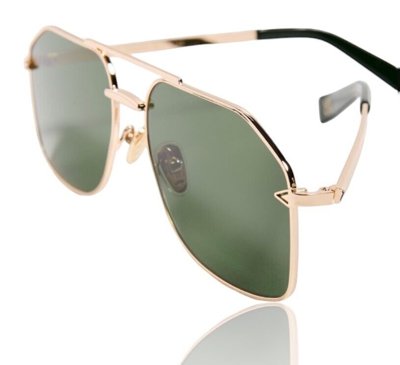 Naked Pear Karen Walker Pampel aviator sunglasses with polished gold metal frames and vibrant grass-green lenses.
