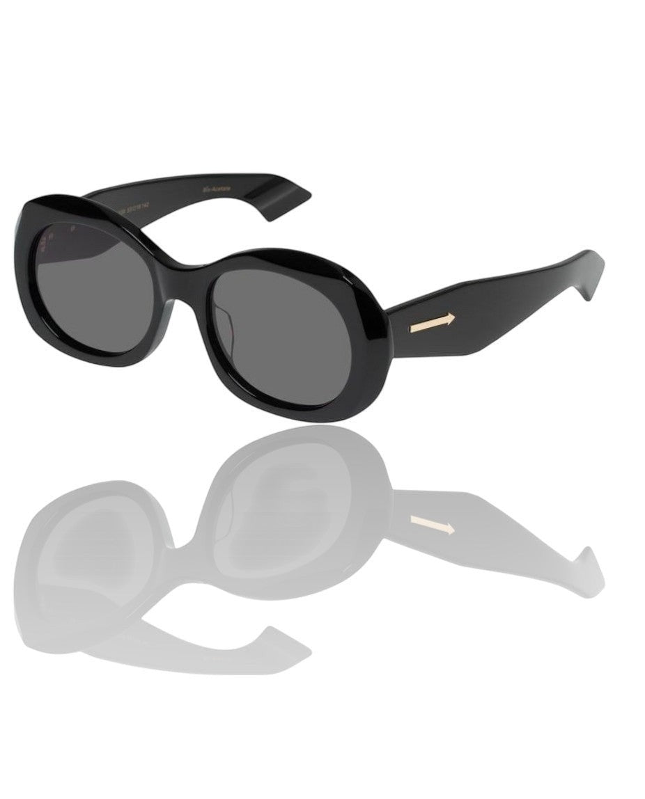 Naked Pear Karen Walker Parlour B oversized black oval acetate sunglasses with smoke lenses and iconic arrow branding.