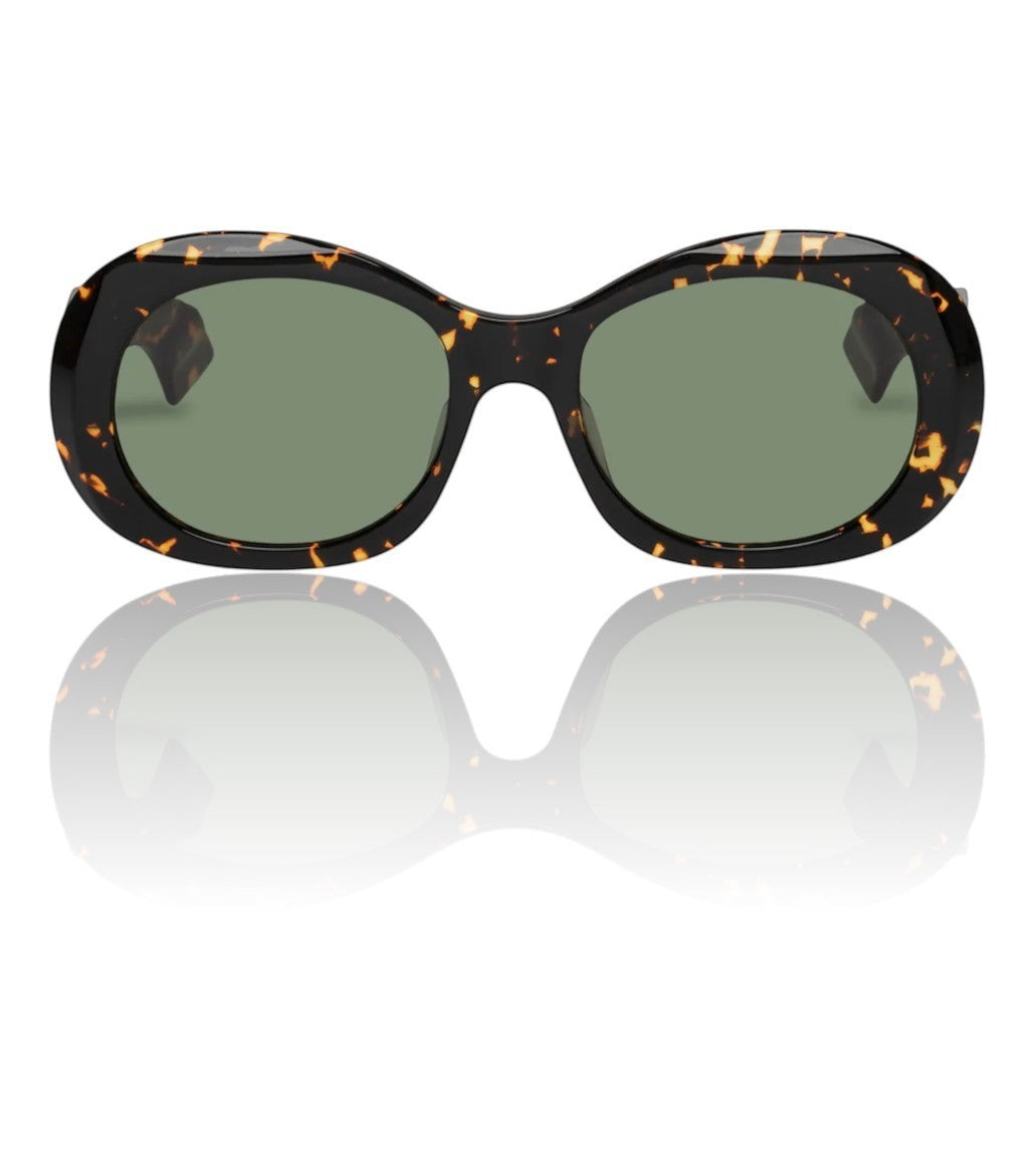 Naked Pear Karen Walker Parlour oval sunglasses in cracked tortoise shell acetate with green lenses.