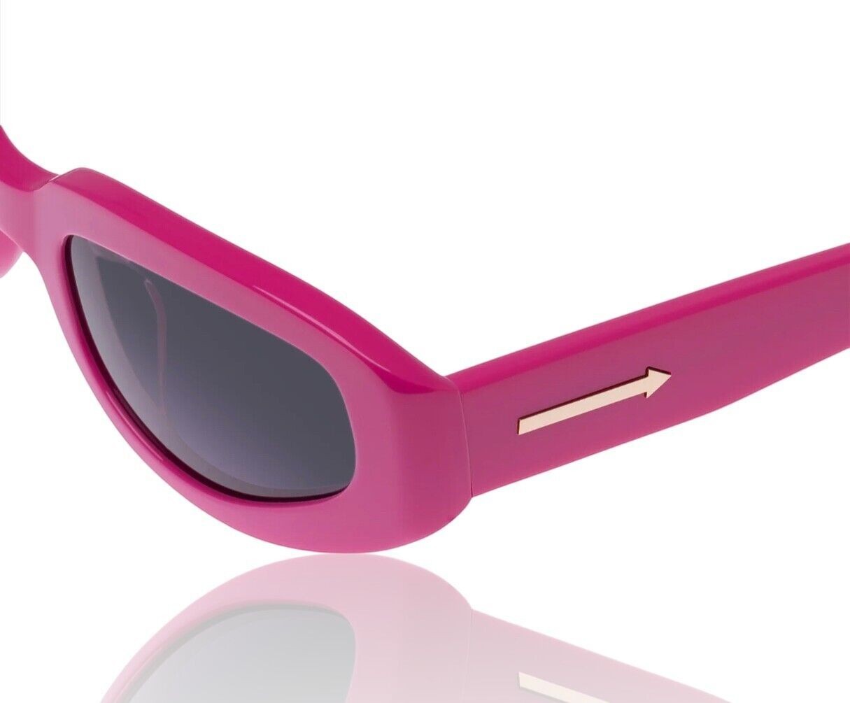 Naked Pear Karen Walker Rally sunglasses in glossy fuchsia pink acetate with smoke grey lenses and gold arrow detail.
