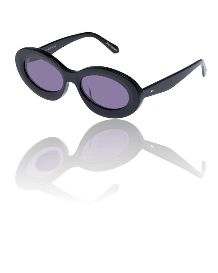 Naked Pear Karen Walker Rapture B black oval bio-acetate sunglasses with grey mono lenses and gold arrowhead detail.