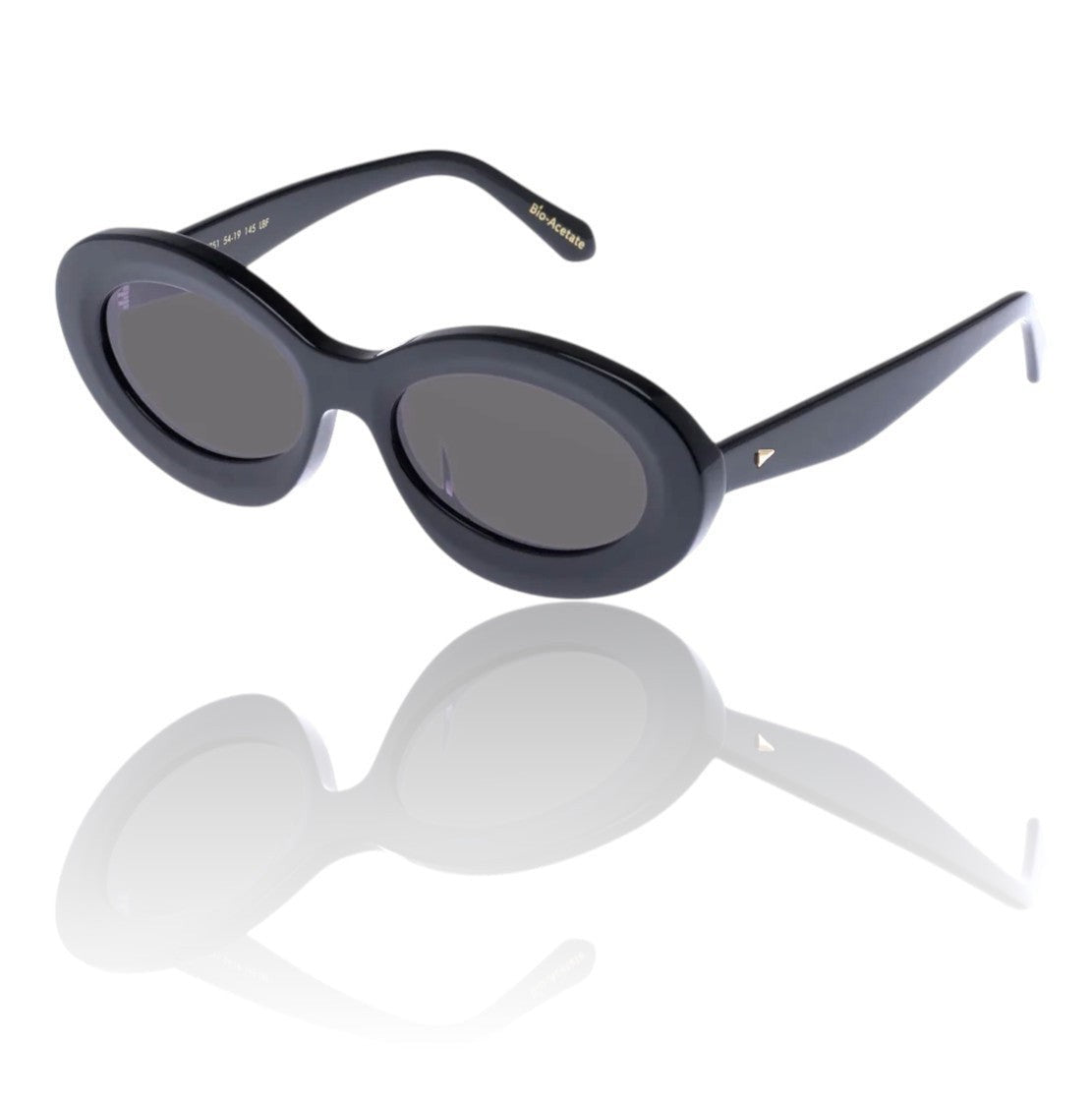 Naked Pear Karen Walker Rapture B black bio-acetate oval sunglasses with grey lenses and gold arrowhead temple detail.