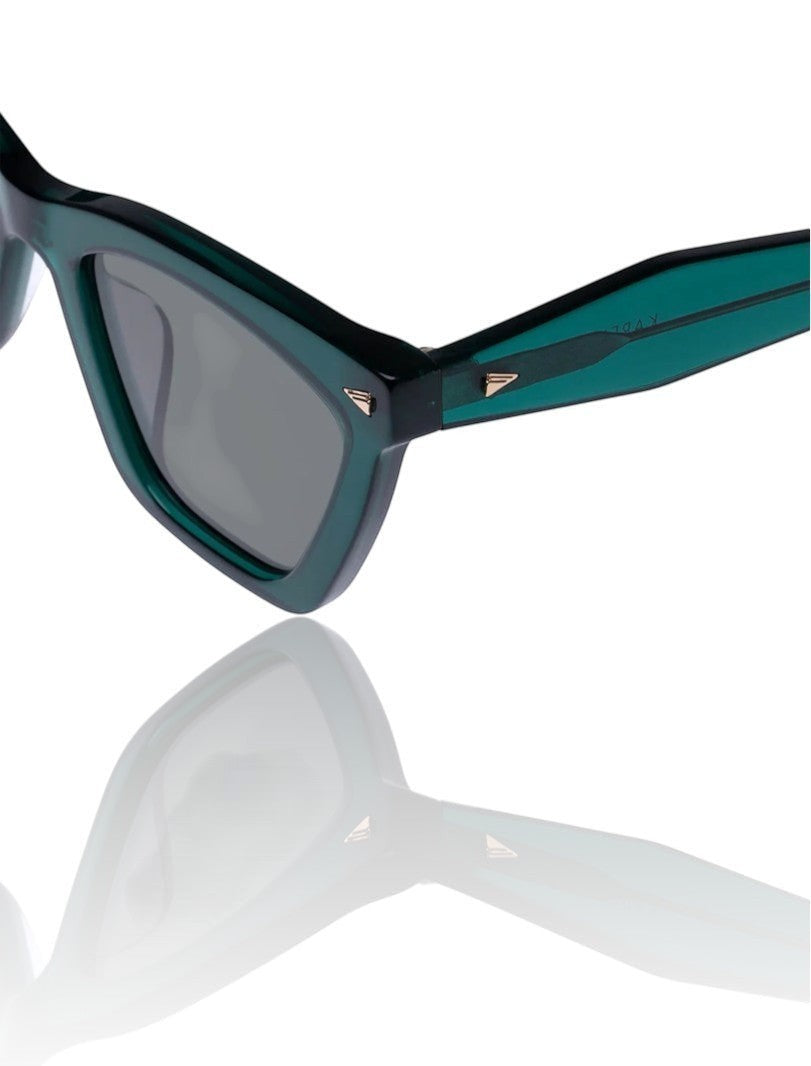 Naked Pear Karen Walker Spellbound emerald green cat-eye acetate sunglasses with gold arrow hardware and green lenses.