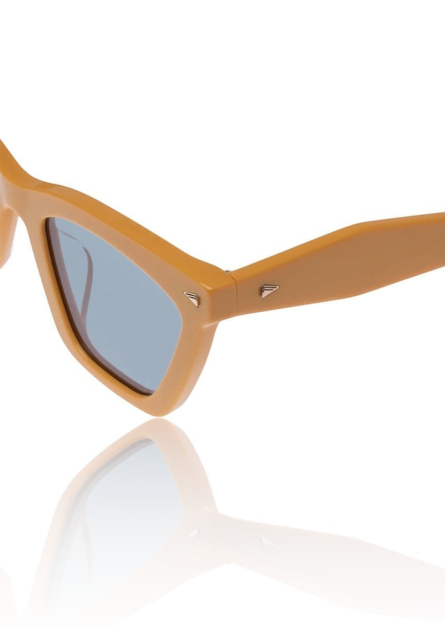 Naked Pear Karen Walker Spellbound cat-eye sunglasses in marigold acetate with emerald lenses and gold arrow hardware.