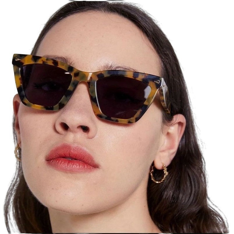 Naked Pear Karen Walker Spellbound cat-eye sunglasses in crazy tortoise shell acetate with smoke mono lenses.