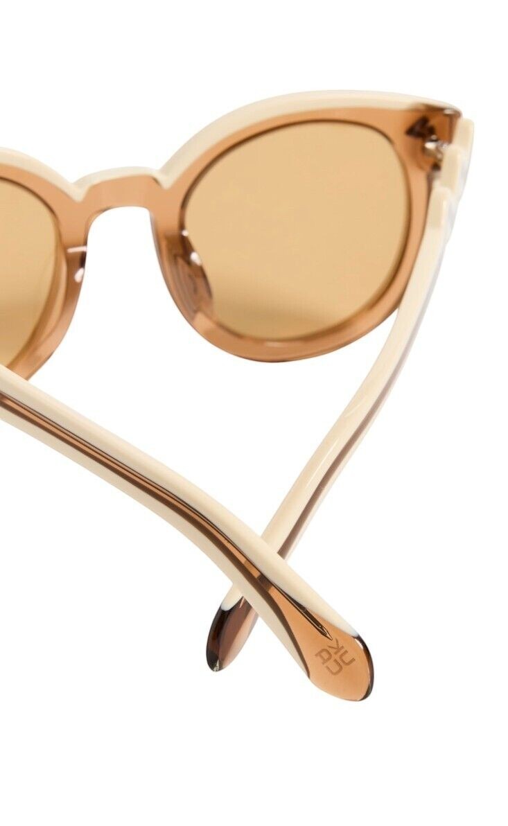 Naked Pear Karen Walker Super Wavy Duper sunglasses in ochre and cream with wavy arms and tan mono lenses.