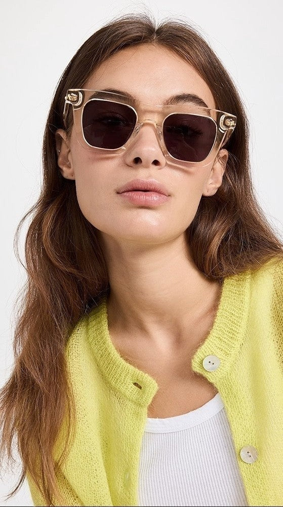 Naked Pear Karen Walker Triple Ripple square sunglasses with vintage clear acetate frames and grey mono lenses.