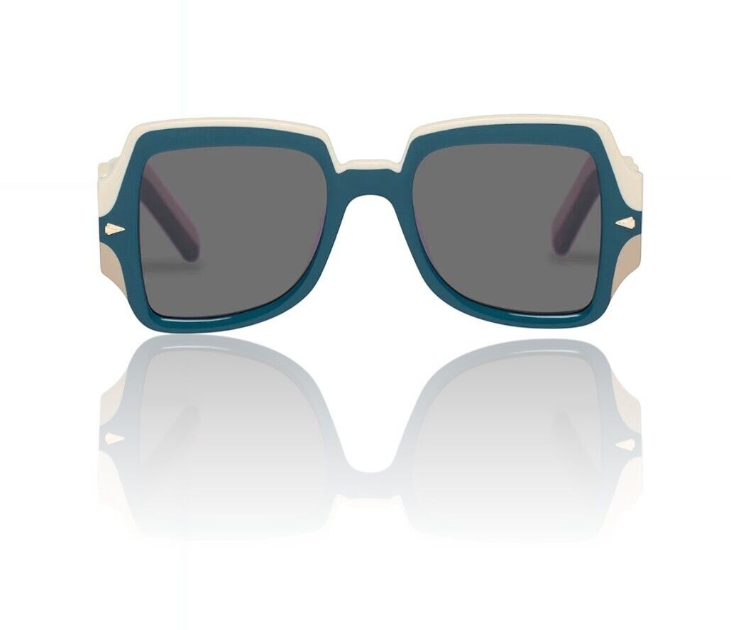 Naked Pear Karen Walker Wavy Ultra B sunglasses in ocean triple bio-acetate with square frames and grey mono lenses.