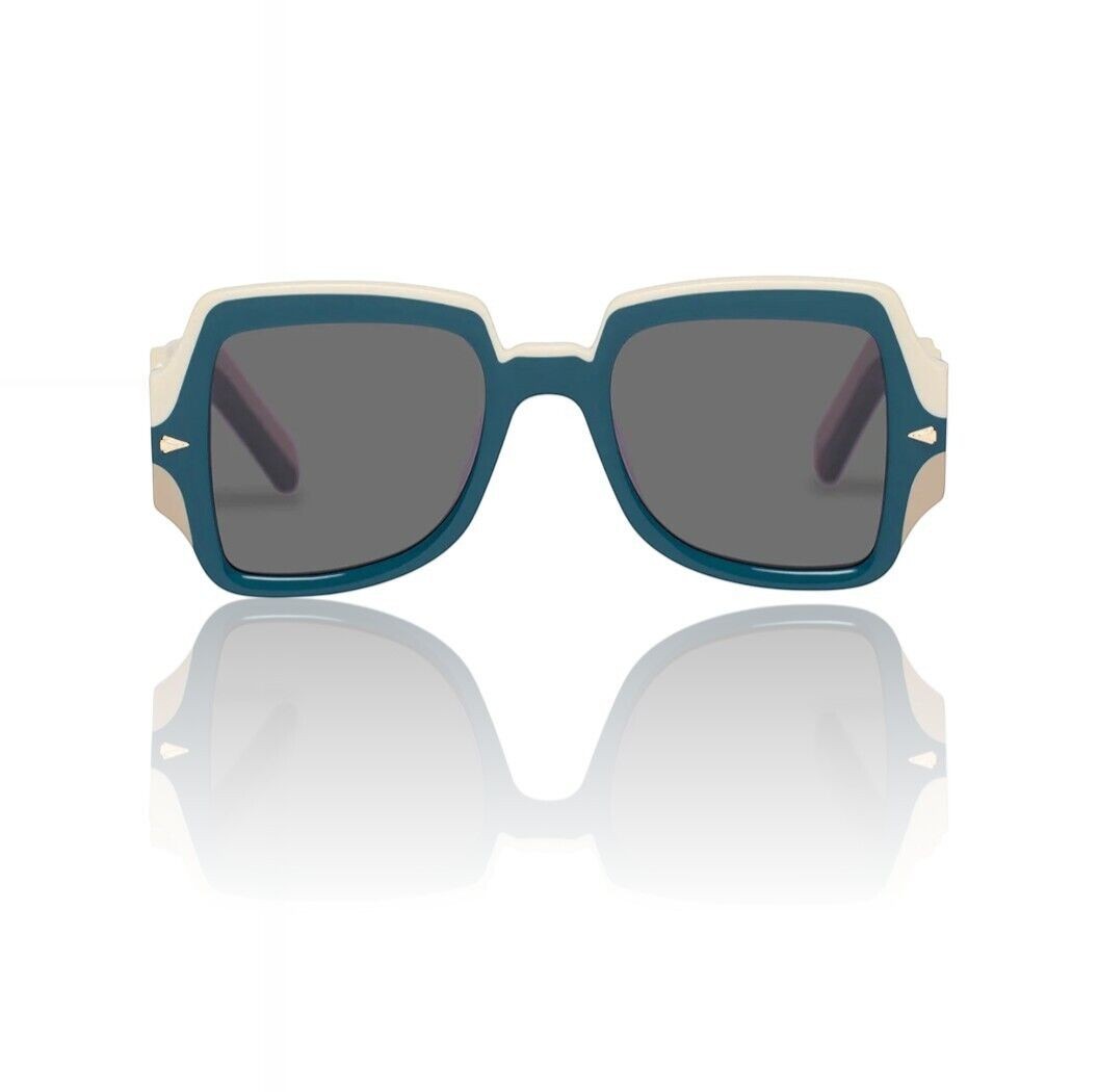Naked Pear Karen Walker Wavy Ultra B sunglasses in ocean blue and white bio-acetate with grey mono lenses.