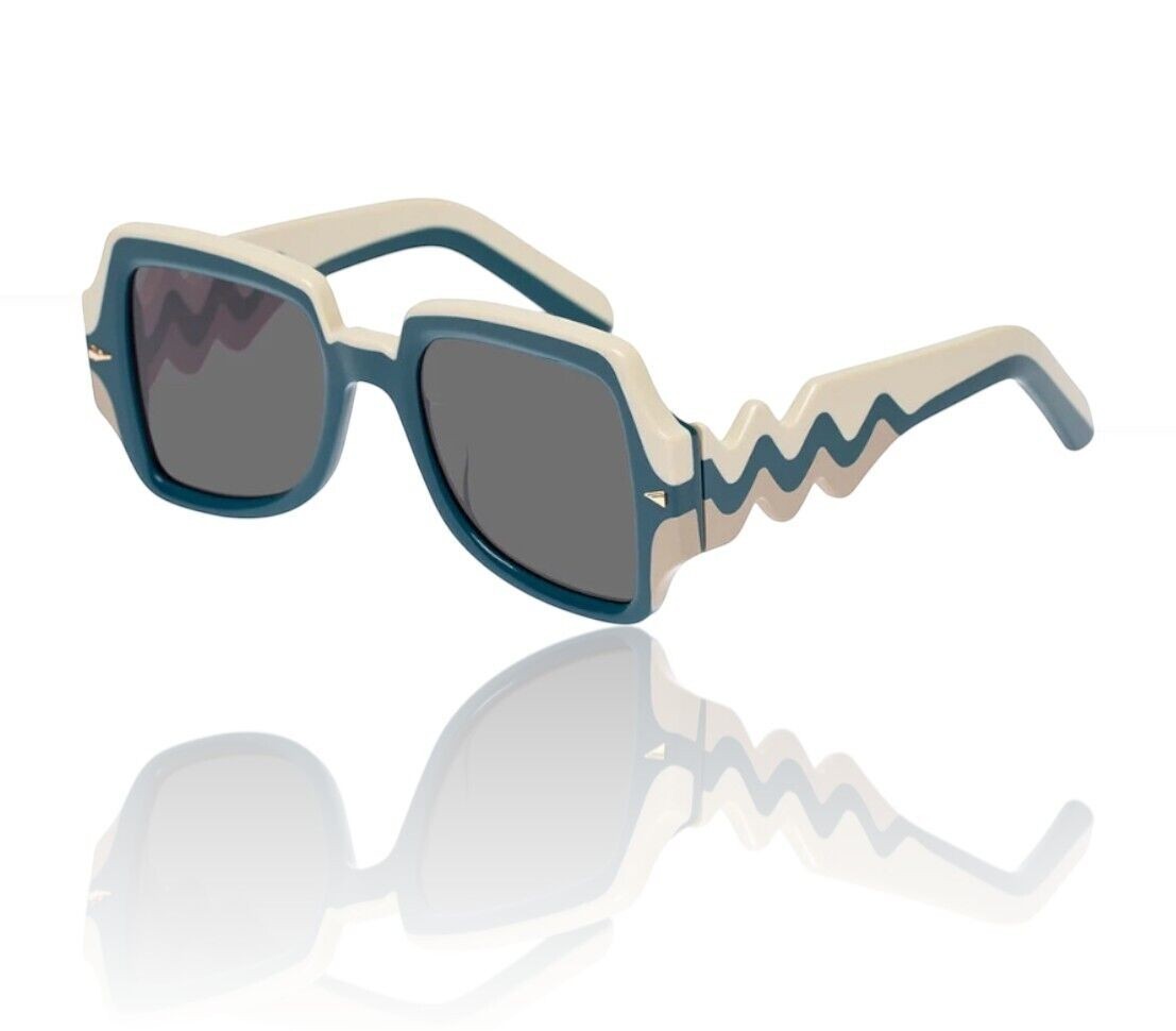 Naked Pear Karen Walker Wavy Ultra B sunglasses in ocean blue and white bio-acetate with retro square frames.