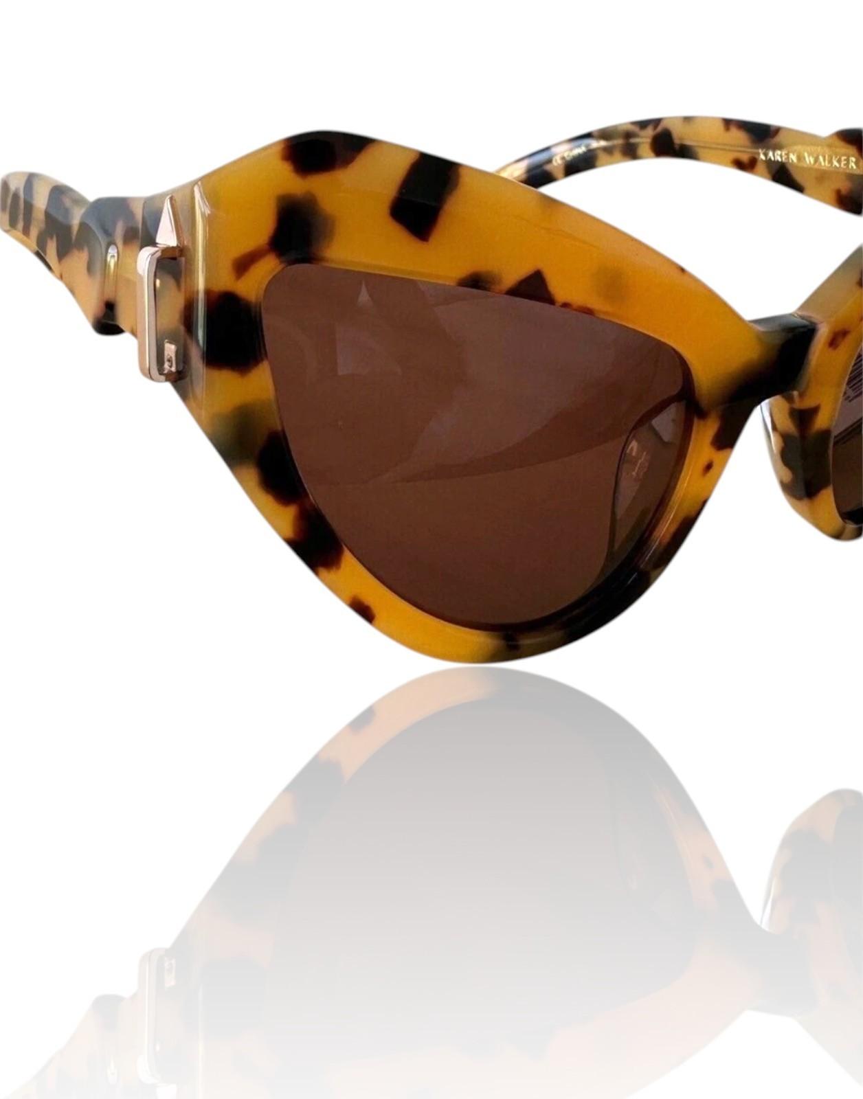 Sunglasses with tortoiseshell frame and brown lenses on a white background