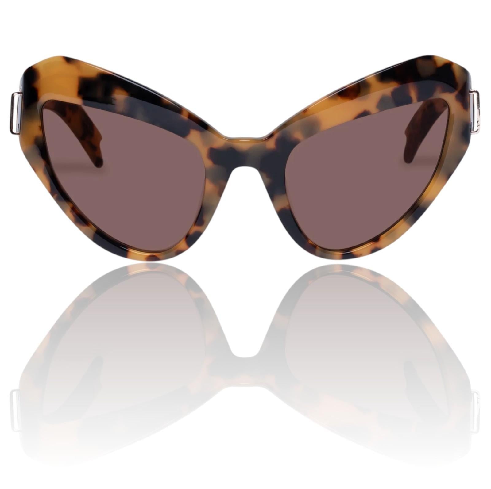 Tortoiseshell cat-eye sunglasses with a reflective white surface