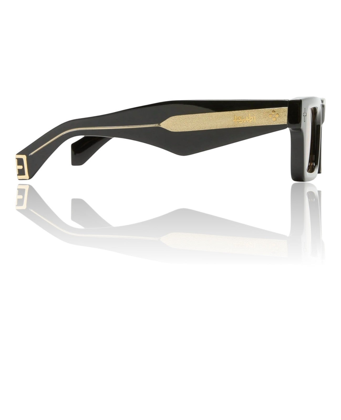 Naked Pear Ksubi Goodsen II unisex sunglasses in glossy black acetate with gold temple detailing and amber lenses.