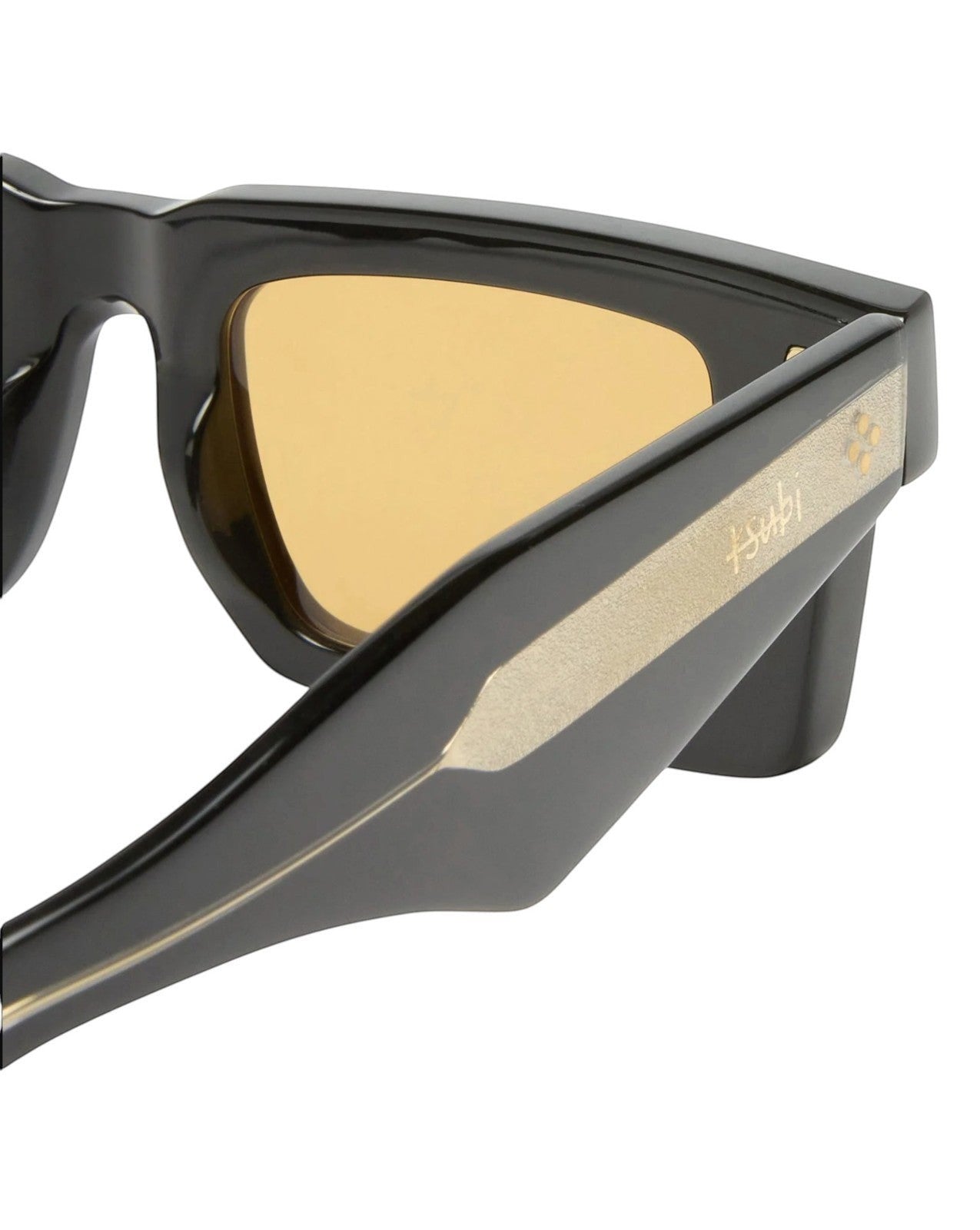 Naked Pear Ksubi Smiths II sunglasses featuring a black acetate frame, amber lenses, and gold temple logo detail.