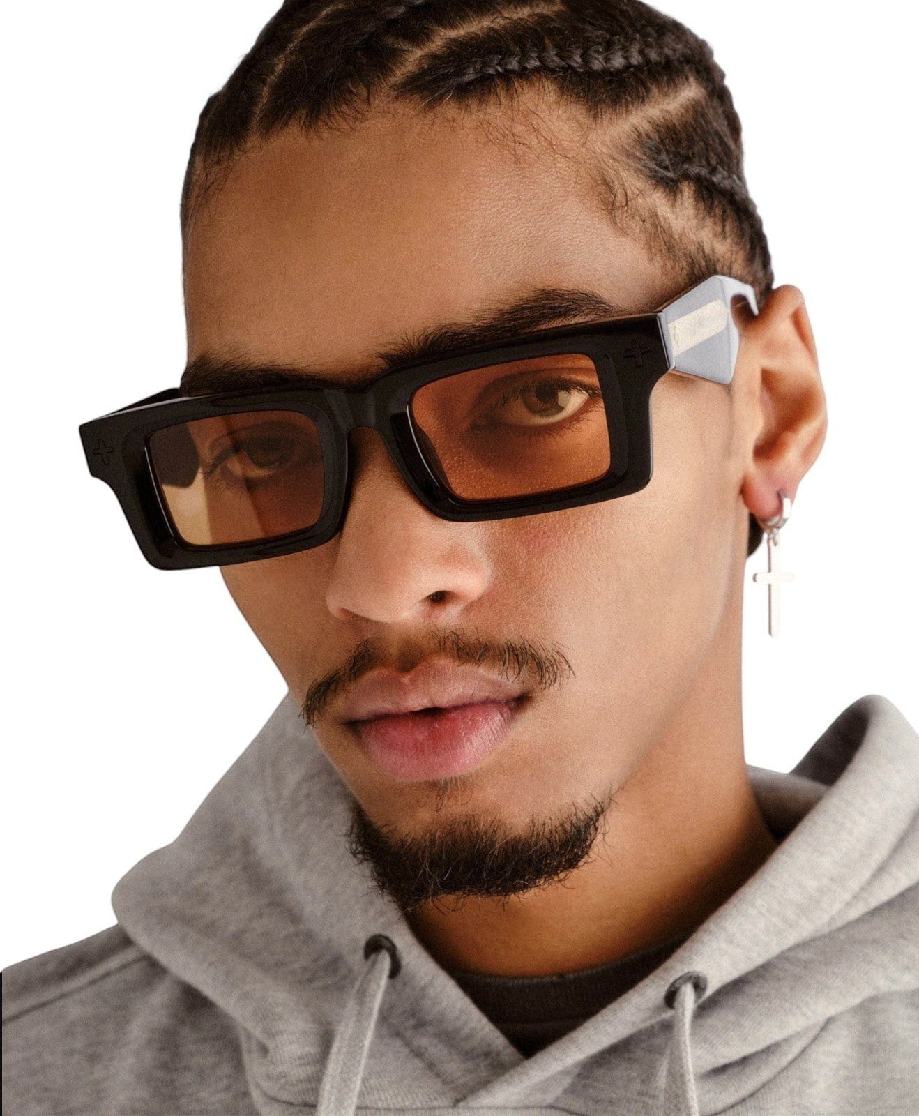 Naked Pear Ksubi Smiths II unisex rectangle sunglasses with black acetate frames and amber lenses on a model