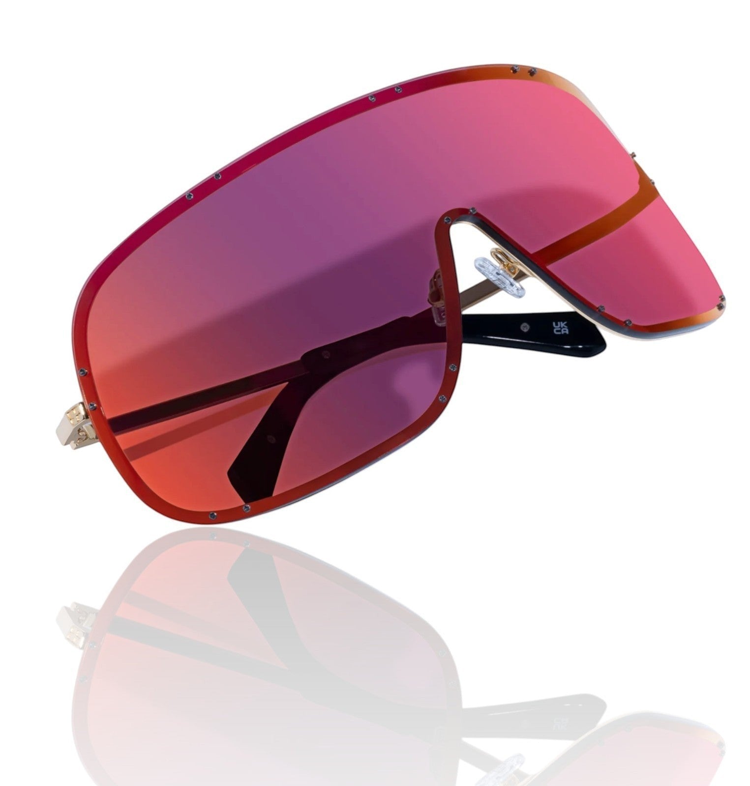 Naked Pear Ksubi Tyrell shield sunglasses featuring a gold frame and oversized pink and red mirror wrap-around lenses.