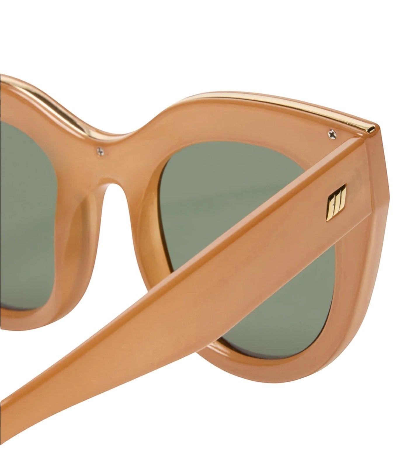 Naked Pear Le Specs Air Heart cat eye sunglasses in caramel acetate with gold metal top-bar and khaki green lenses.