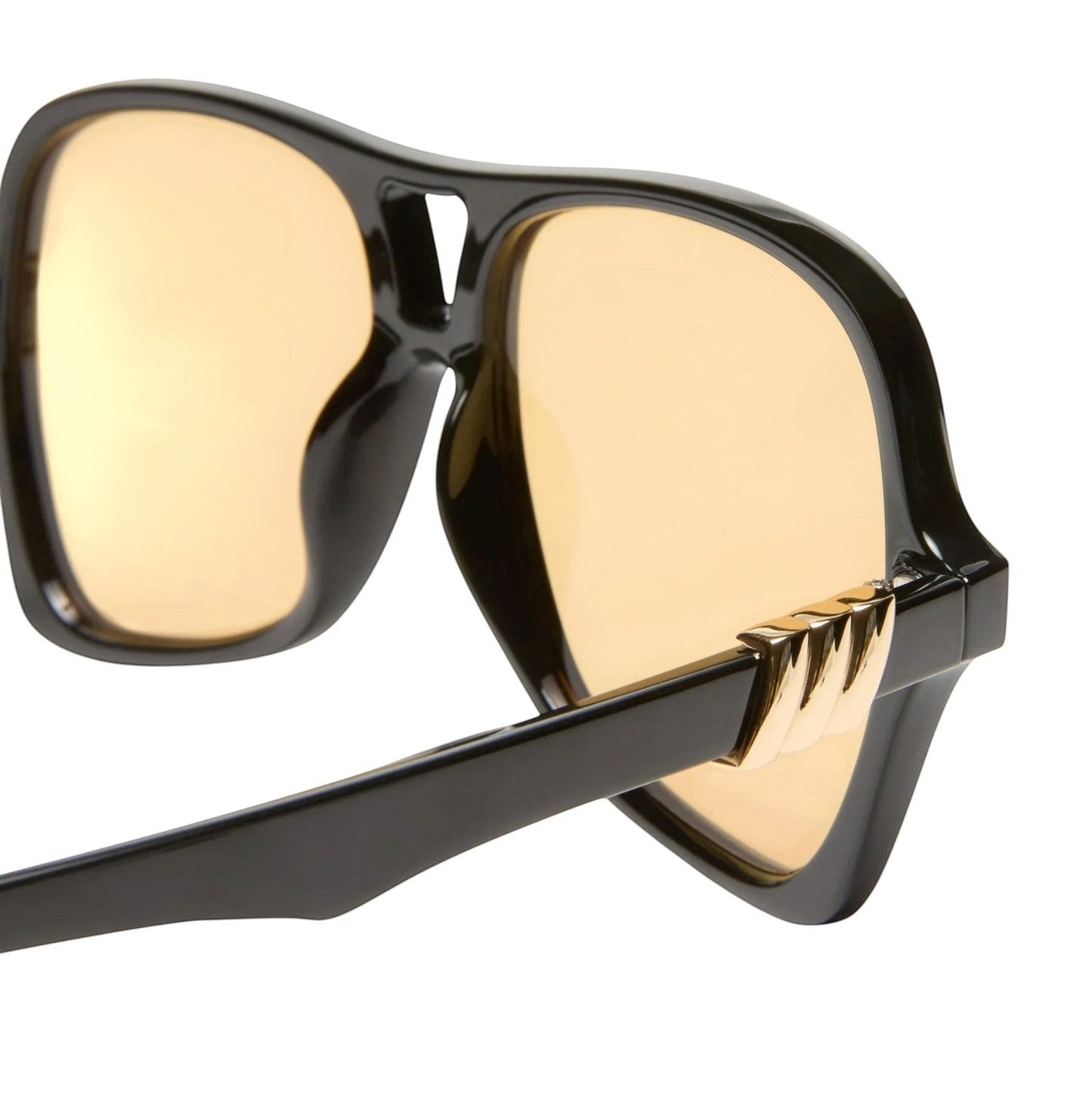 Naked Pear Le Specs Fortune Teller sunglasses with black acetate frames and mustard mono lenses in a 70s aviator style.