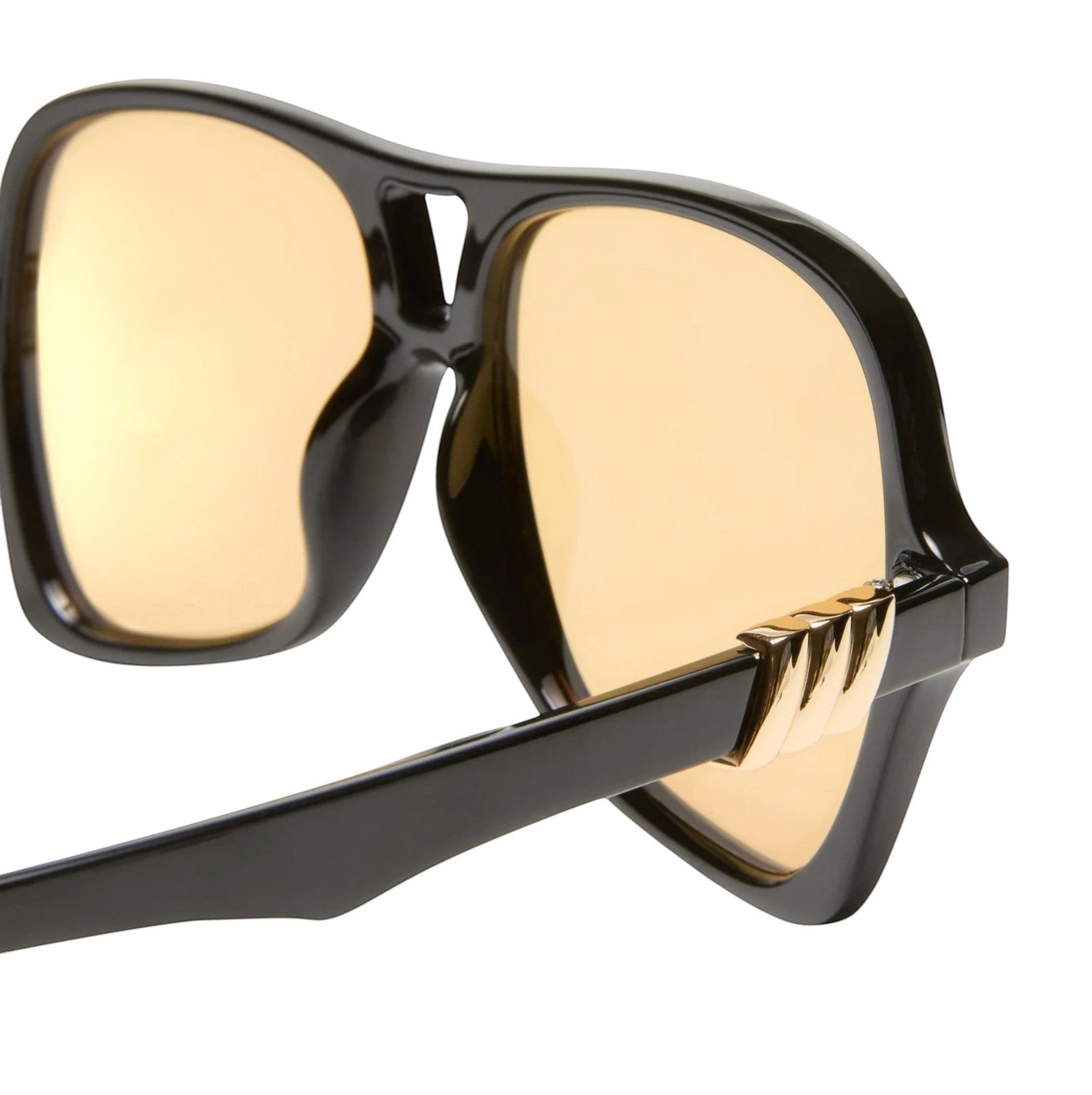 Naked Pear Le Specs Fortune Teller sunglasses with black acetate frames and mustard mono lenses in a 70s aviator style.