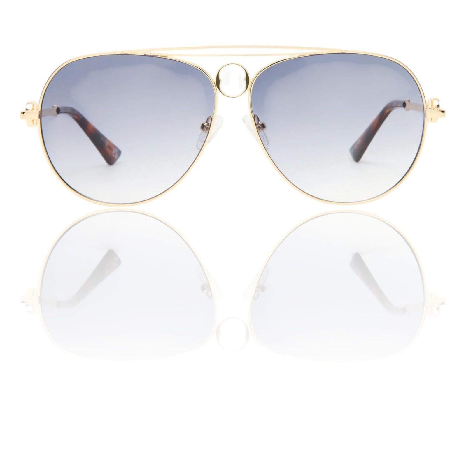 Gold-framed sunglasses with blue-tinted lenses on a white background