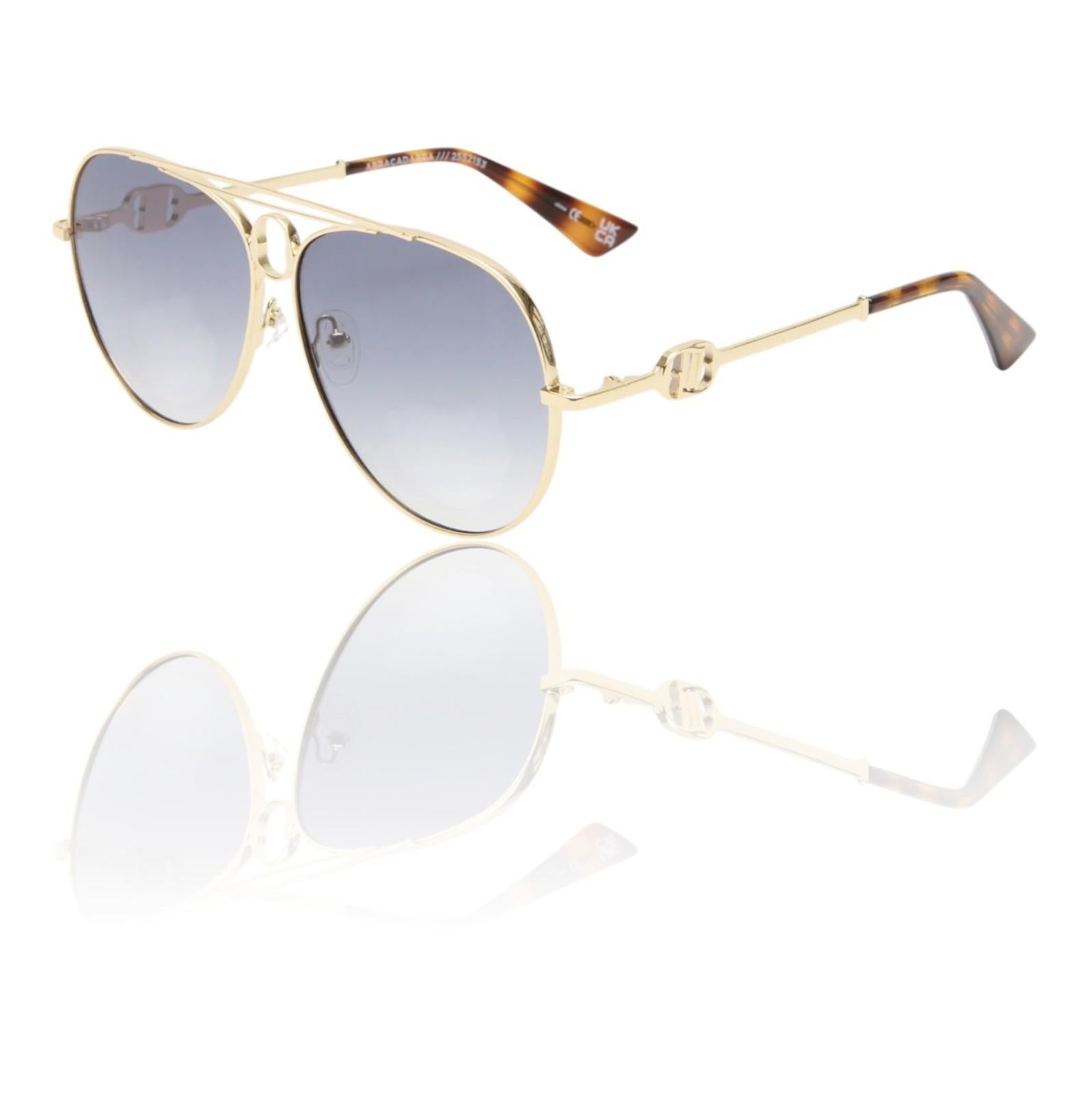 Gold-framed sunglasses with gradient lenses on a white background