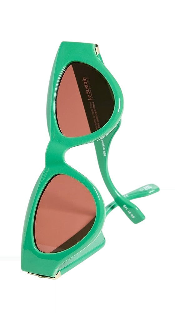 Green sunglasses with brown lenses on a white background