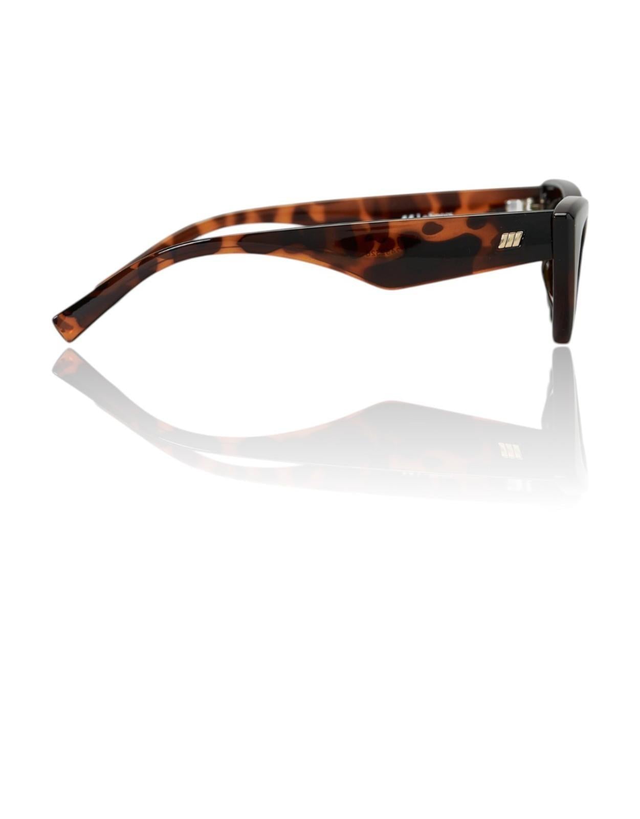 Sunglasses with tortoiseshell frame on a white background