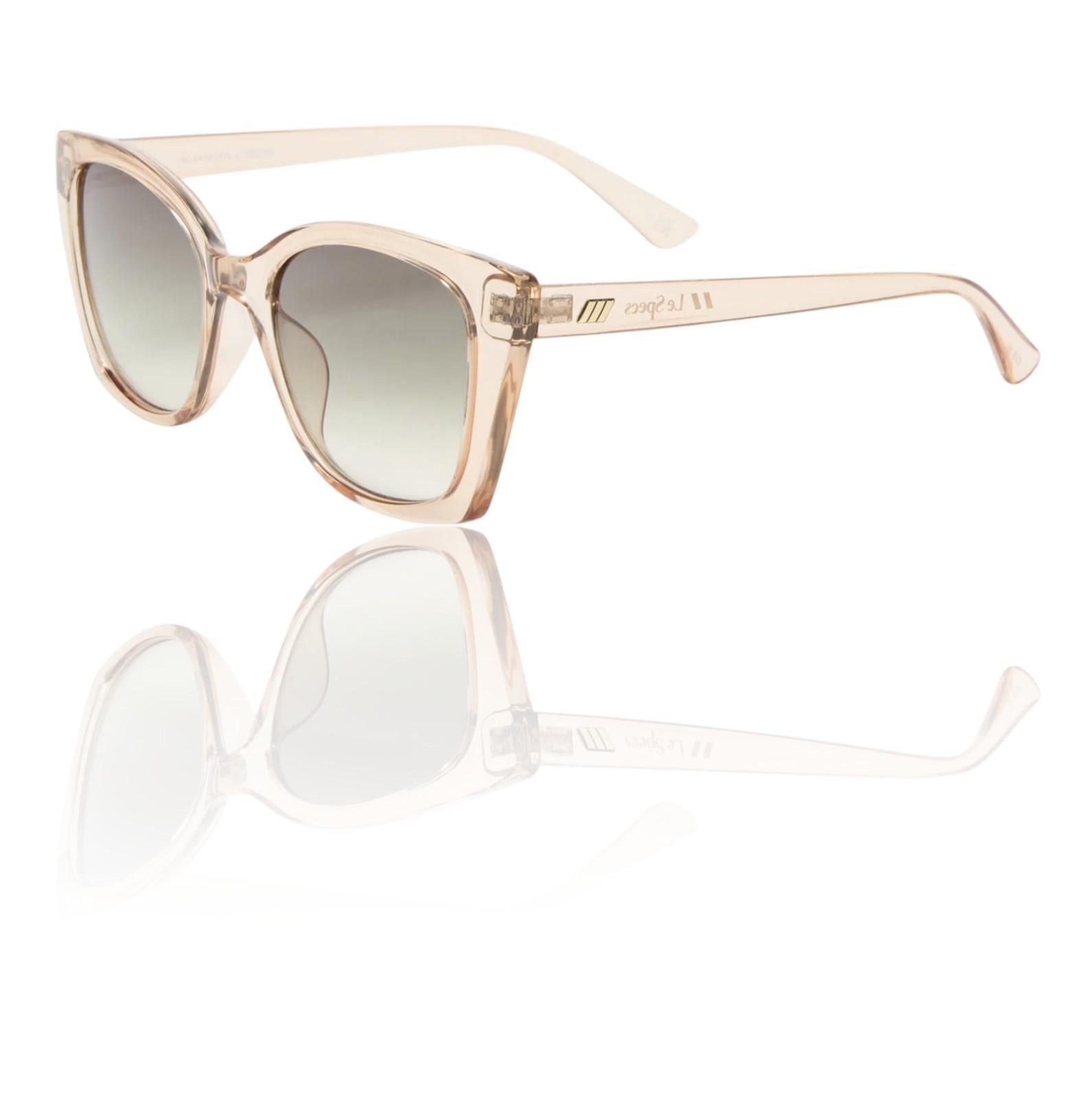 Beige sunglasses with a reflective surface on a white background