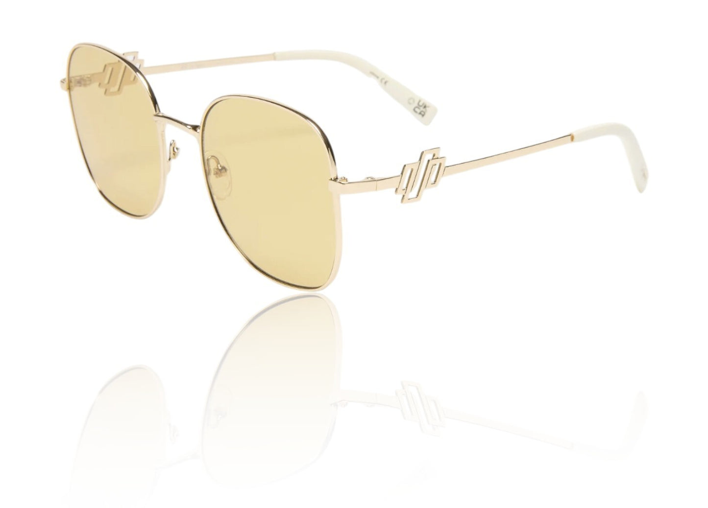 Gold sunglasses with yellow lenses on a white background