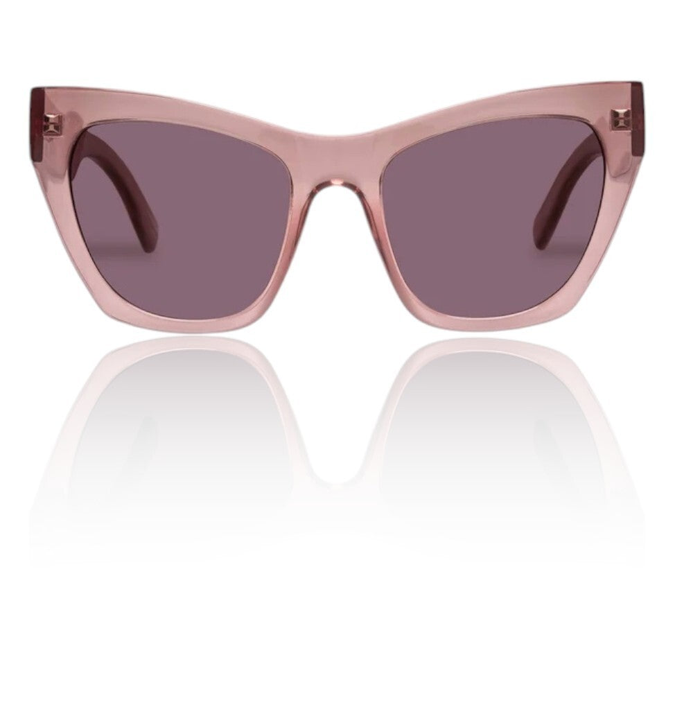Pink sunglasses with a reflective surface on a white background