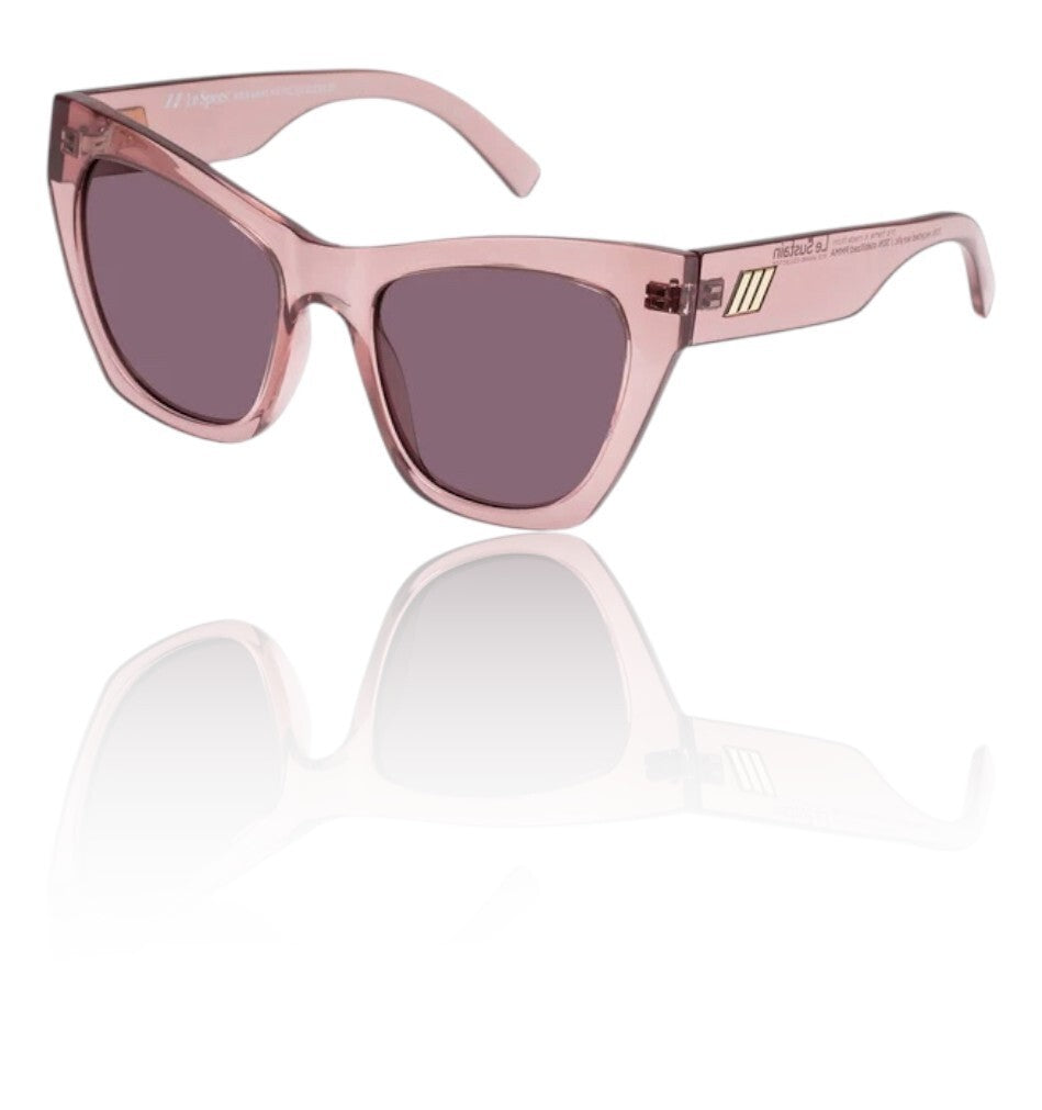 Pink sunglasses with a reflective surface on a white background