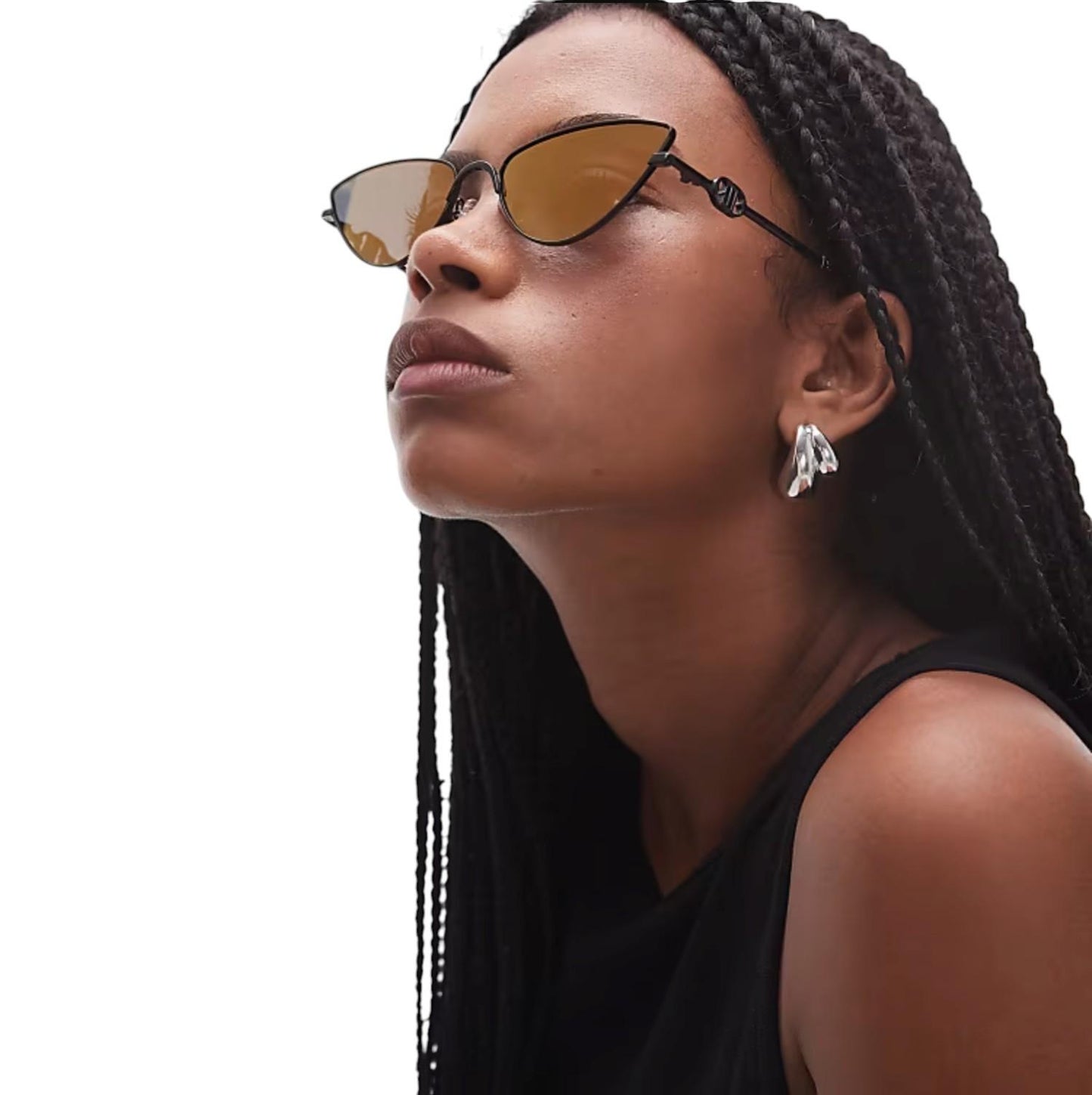 Woman wearing sunglasses with a neutral background