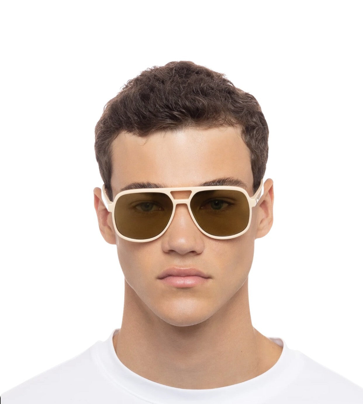 Person wearing aviator sunglasses with a white frame on a white background