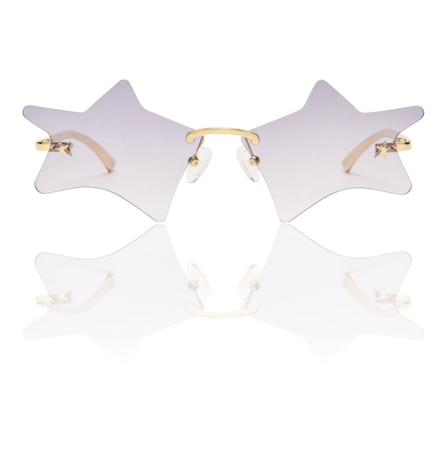 Star-shaped sunglasses with gold frames on a white background