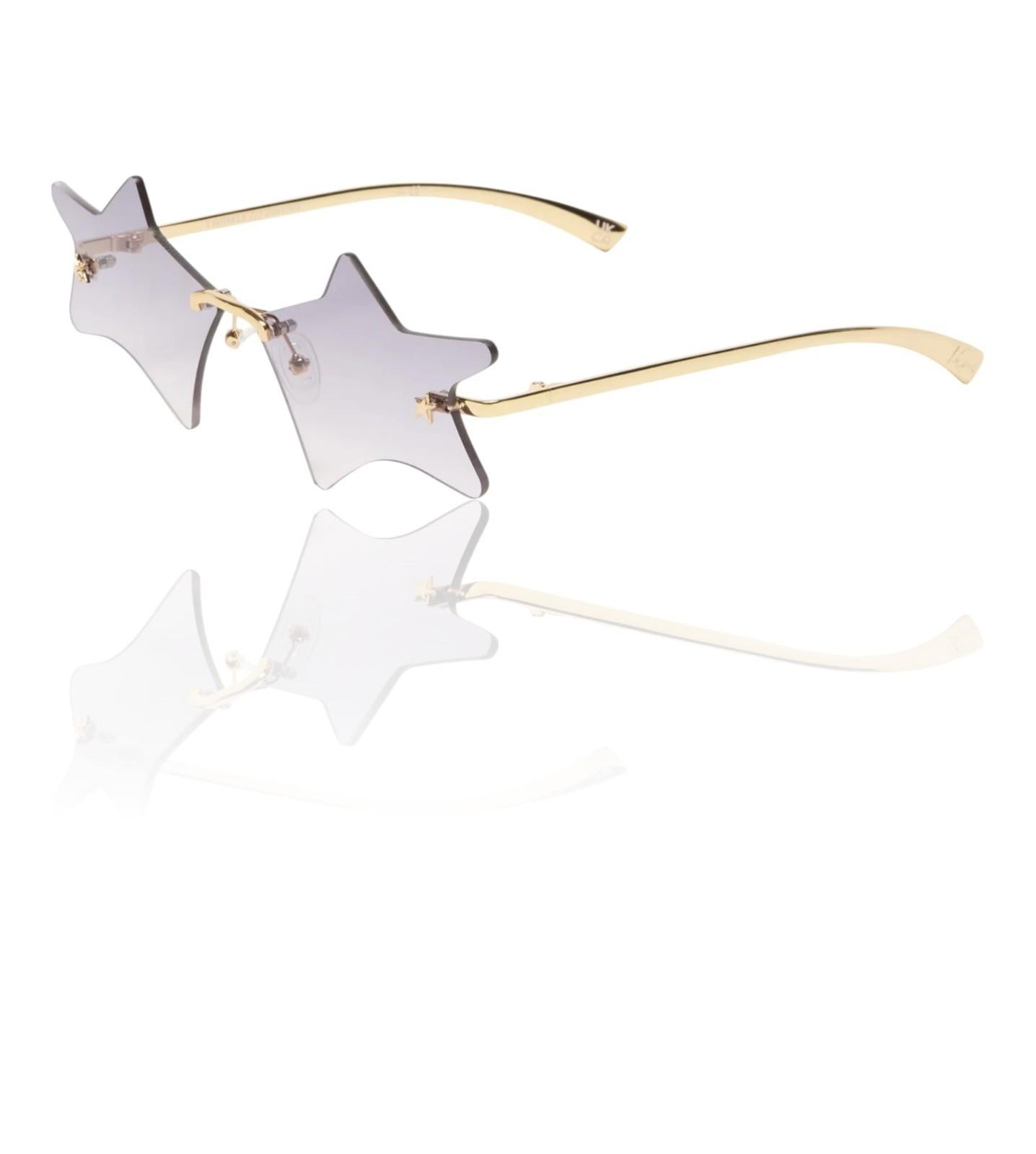 Star-shaped sunglasses with gold frame on a white background
