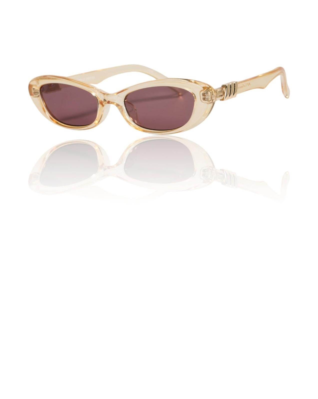 Beige sunglasses with brown lenses on a white background