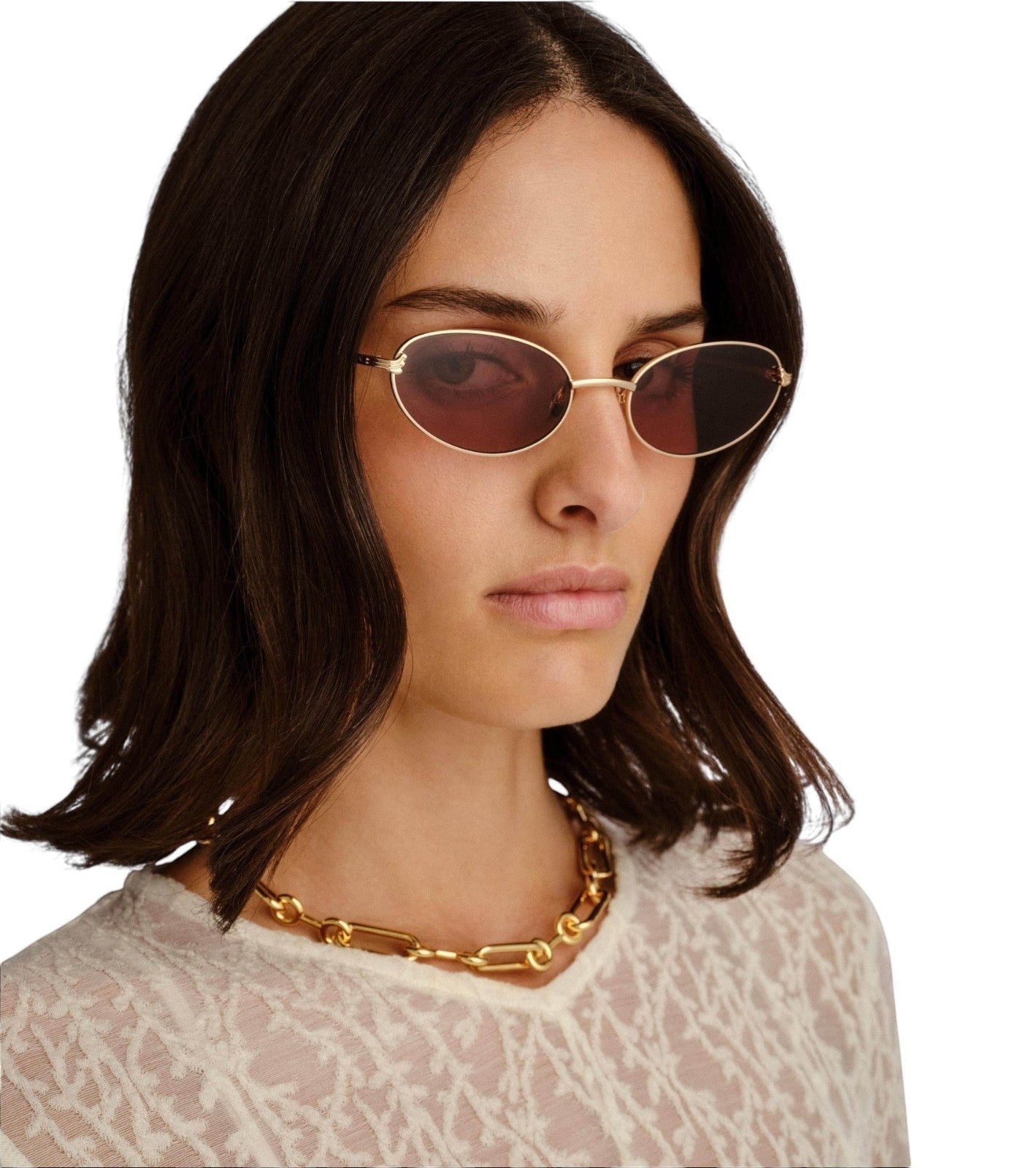 Naked Pear Luv Lou The Rose cat-eye sunglasses with gold metal frames and tan mono lenses worn by a woman