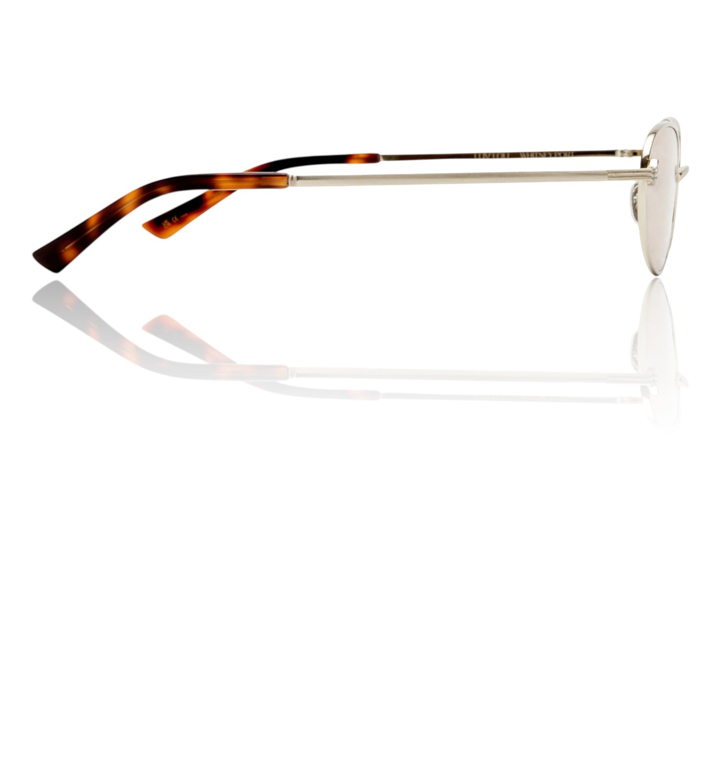 Naked Pear Luv Lou The Rose sunglasses in brushed silver with cat-eye metal frames and tan mono lenses, side view.