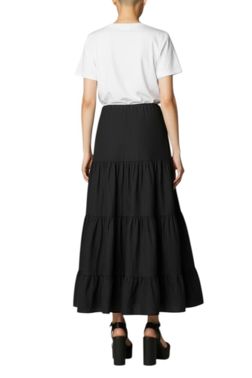 AI generated image of Person wearing a black tiered skirt and white top on a white background
