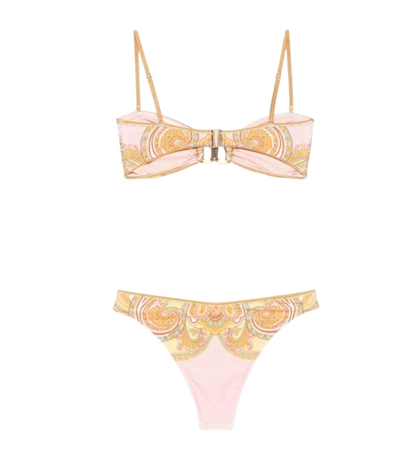 Two-piece swimsuit with pink and yellow pattern on a white background
